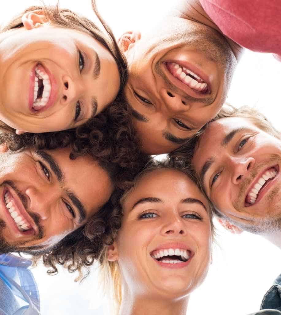 Smiling person showcasing white teeth after laser whitening treatment Aylesbury